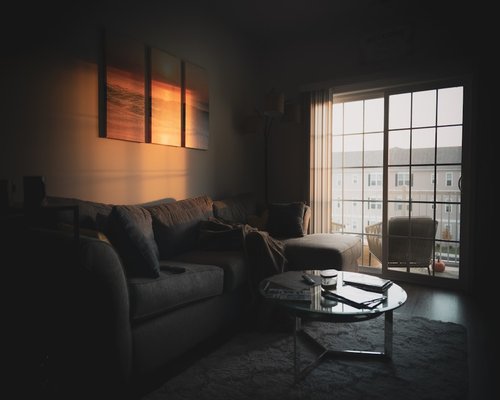 Sunlight entering a bright living room setup